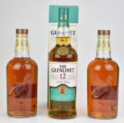 Two bottles of The Naked Grouse Scotch Whisky and a bottle of Glenlivet 12 Year Single Malt Scoth
