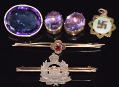 A 9ct gold 'Suffolk Regiment' brooch (2.2g), 9ct gold brooch (1.3g), 9ct gold pendant set with