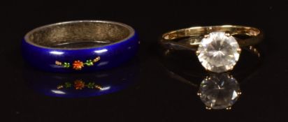A 9ct gold ring set with cubic zirconia and a silver ring set with enamel