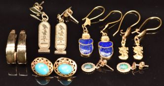 Five pairs of 9ct gold earrings including Egyptian, lapis lazuli in the form of beetles, opal
