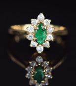A 14k gold ring set with a marquise cut emerald surrounded by diamonds, 3.0g, size M