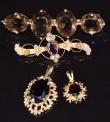 Two 9ct gold pendants set with garnets (4.9g), Edwardian 9ct gold brooch set with garnets and seed