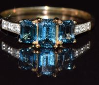 A 9ct gold ring set with topaz and diamonds, 1.4g, size K
