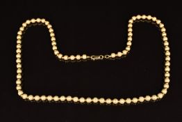 A 14k gold necklace made up of textured and smooth circular beads, 16.8g