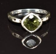 A 9ct white gold ring set with tourmaline and white sapphires, 3.0g, size N