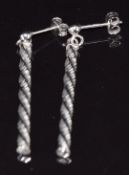 A pair of 9ct white gold earrings, 1.3g