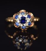 A 9ct gold ring set with sapphires and spinel, 2.4g, size J