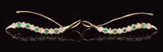 A pair of 14k gold earrings set with emeralds and diamonds, 2.8g