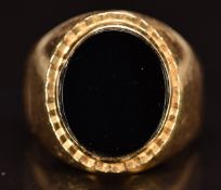 An 18ct gold French ring set with onyx, 11.4g, size P