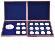 Windsor Mint two sets of gold plated WW2 commemorative coins, in deluxe fitted cases