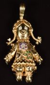 A 9ct gold pendant in the form of a girl with pigtails, set with cubic zirconia, length 6cm, 19.4g