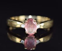 A 9ct gold ring set with quartz and topaz, 2.8g, size N