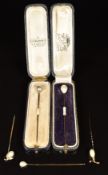 Five 9ct gold stick pins, all set with faux pearls, two in antique boxes