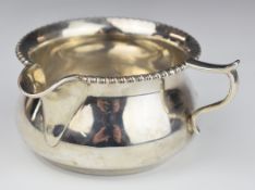 George V hallmarked silver jug, Sheffield 1913, maker Lee & Wigfull, width 11cm, weight 123g