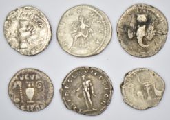Six Roman silver coins to include Caracella, Trajan, Vespasian and Nerva, all around 18mm diameter