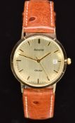 Accurist 9ct gold gentleman's wristwatch with date aperture, gold hands, hour markers and dial and