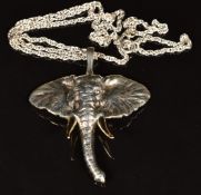 A hallmarked silver pendant in the form of an elephant, on silver chain, maker C G & S, 40g