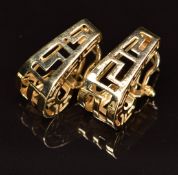 A pair of 14k gold hoop earrings and a pair of 14k gold earrings in a Greek key design, 8.4g