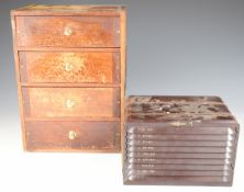 Bakelite chest of nine shallow drawers, each with 100 compartments housing capsules of very fine
