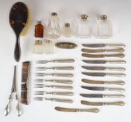 Hallmarked silver mounted and handled items including knives, brush, comb, dressing table bottles