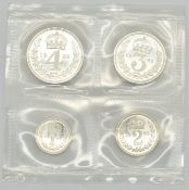 1989 Queen Elizabeth II Maundy set, first bust, in red leather pouch