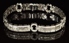 Art Deco style 18k white gold bracelet set with round and baguette cut diamonds, total diamond