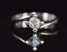 An 18ct white gold ring set with an old mine cut diamond of approximately 0.35ct, 3.4g, size M