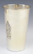 Thai silver beaker with embossed decoration of a deity to front and back, marked to base Alex &