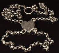 A 19thC unusual silver chain with heart pendant