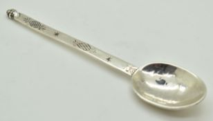 Amy Sandheim Arts & Crafts Celtic style hallmarked silver sifter spoon, London 1925, length 16cm,