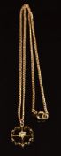 A c1900 9ct gold chain with a 9ct gold pendant set with a diamond, 4.6g