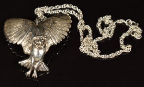 A hallmarked silver pendant in the form of an owl, on silver chain, maker C G & S, 57g