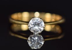 An 18ct gold ring set with a round cut diamond of approximately 0.54ct, 3.0g, size O