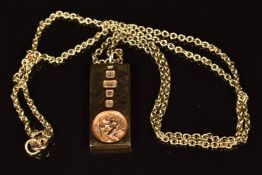 A 9ct gold ingot with embossed St Christopher, on 9ct gold chain, 10.5g