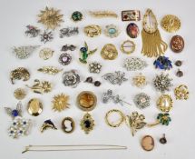 A collection of vintage brooches including Trifari, Sphinx, etc, and a set of studs