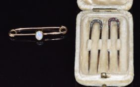 A pair of French c1890 18ct gold hair pins / slides, one set with rose cut diamonds the other with