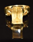 A 14k gold ring set with an emerald cut citrine, 7.1g, size V