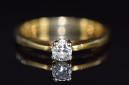 An 18ct gold ring set with a round cut diamond of approximately 0.2ct, 4.0g, size N