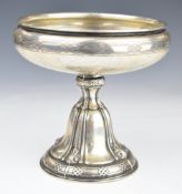 Continental silver pedestal dish with embossed decoration, marked to base 750, diameter 17 x