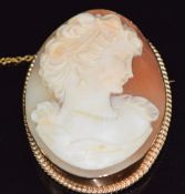 A 9ct gold brooch set with a cameo depicting a young woman, 18.1g