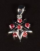 An 18k white gold pendant set with padparadscha sapphires, 2g