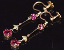 A pair of Edwardian 9ct gold earrings set with garnets and seed pearls, 1.8g