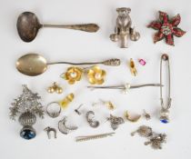 Silver baby's teddy bear rattle / whistle marked 925 and two hallmarked silver spoons, weight of