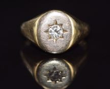 A 9ct gold ring set with a diamond of approximately 0.28ct in a star setting, 6.9g, size Q