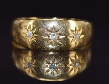 Edwardian 18ct gold ring set with three diamonds in star settings, Chester 1905, 2.7g, size P