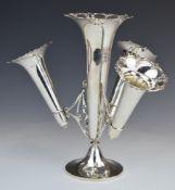George V hallmarked silver epergne with central trumpet surrounded by three smaller trumpet vases,