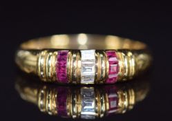 An 18k gold ring set with diamonds and calibre cut rubies, 2.9g, size N