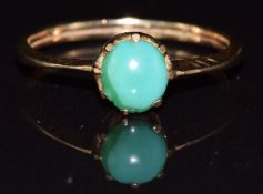 A 9ct gold ring set with a turquoise cabochon, 2g, size M