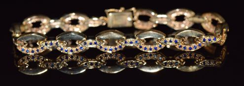 A 9ct gold bracelet set with sapphires, 18.4g