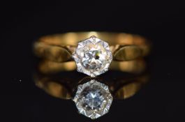 An 18ct gold ring set with a diamond of approximately 0.25ct in a platinum illusion setting, 3.0g,